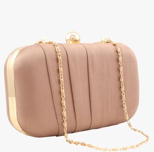 aranica peach silk clutch