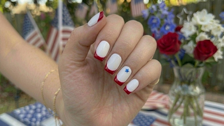  White Nails with Red French Tips & Blue Star